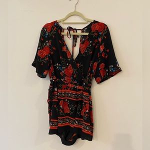 Small red and black romper